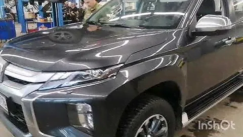 Мицубиси Л200 устанавливаю крышку на кузов